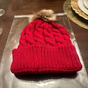 New in packaging. Women Dark Red Puff Beanie Just in Time for the Coldness